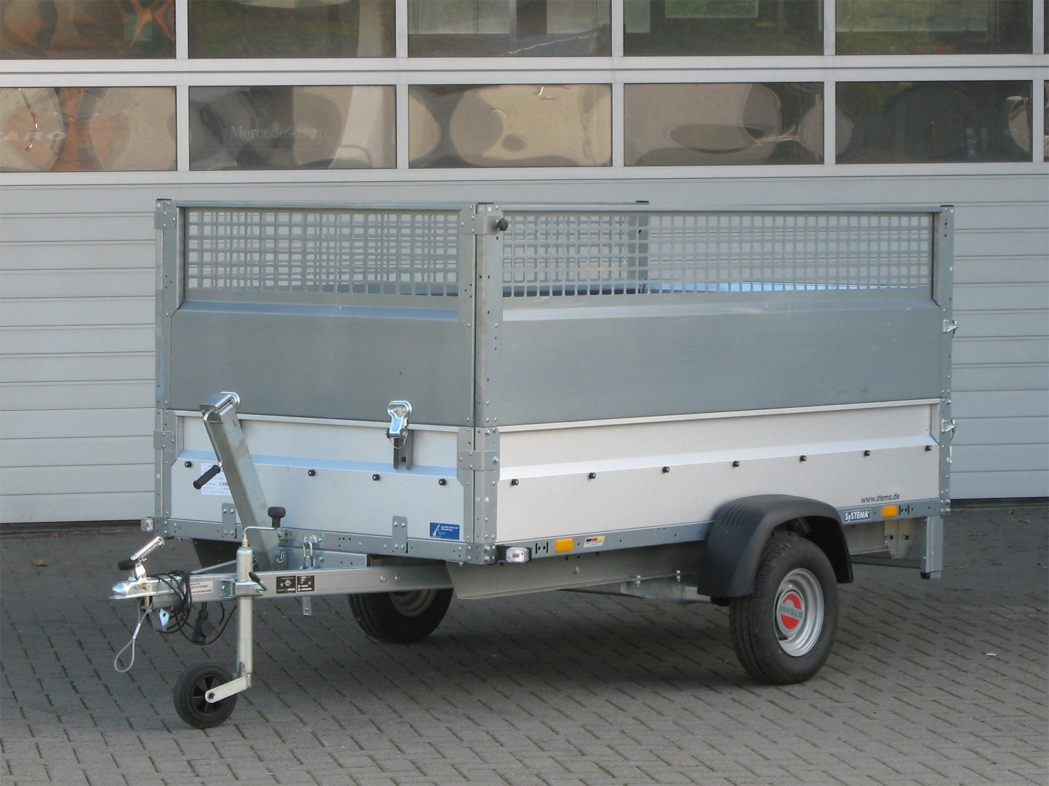 STEMA STP O1 7.5-25-13.1 REX 25 Kippbar mit Auffahrrampe u. Gitteraufsatz
